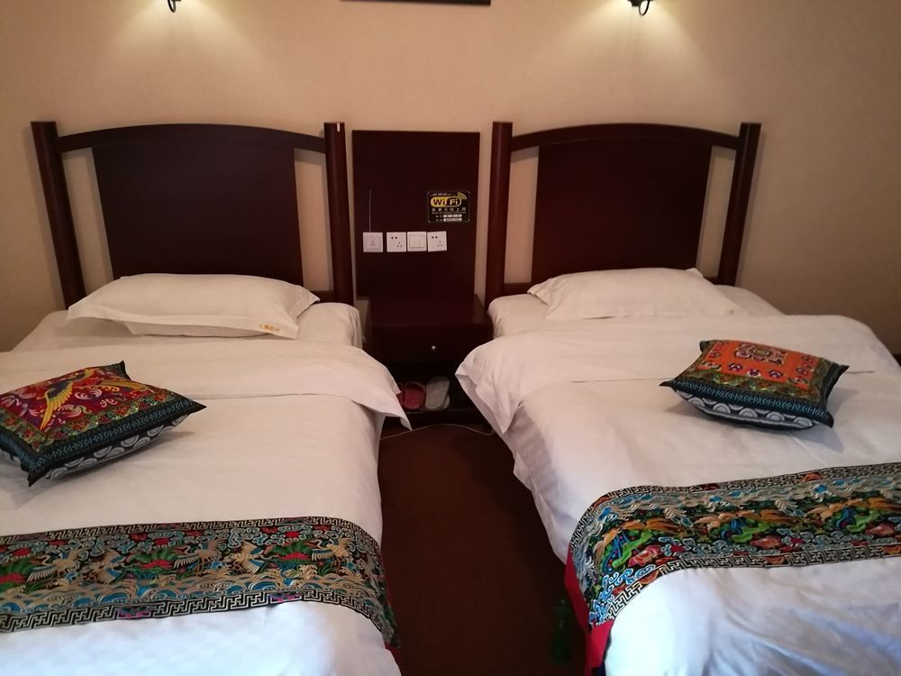 Wo Home Hostel Цзючжайґоу Екстер'єр фото