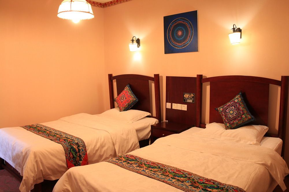 Wo Home Hostel Цзючжайґоу Екстер'єр фото